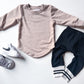 Curved Hem Woven Long Sleeve Tee